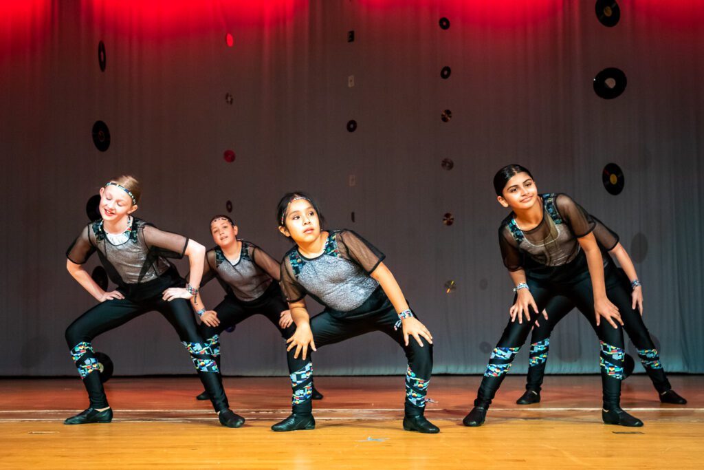 Girls performing at a dance recital